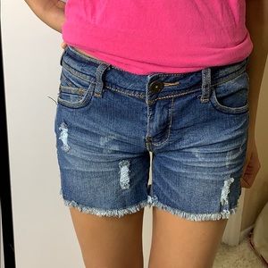 low waisted ripped jean shorts